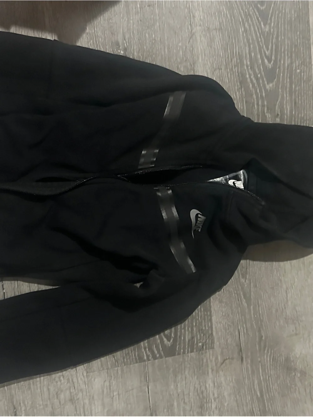 Nike Black Hooded Windbreaker with Chevron Detail